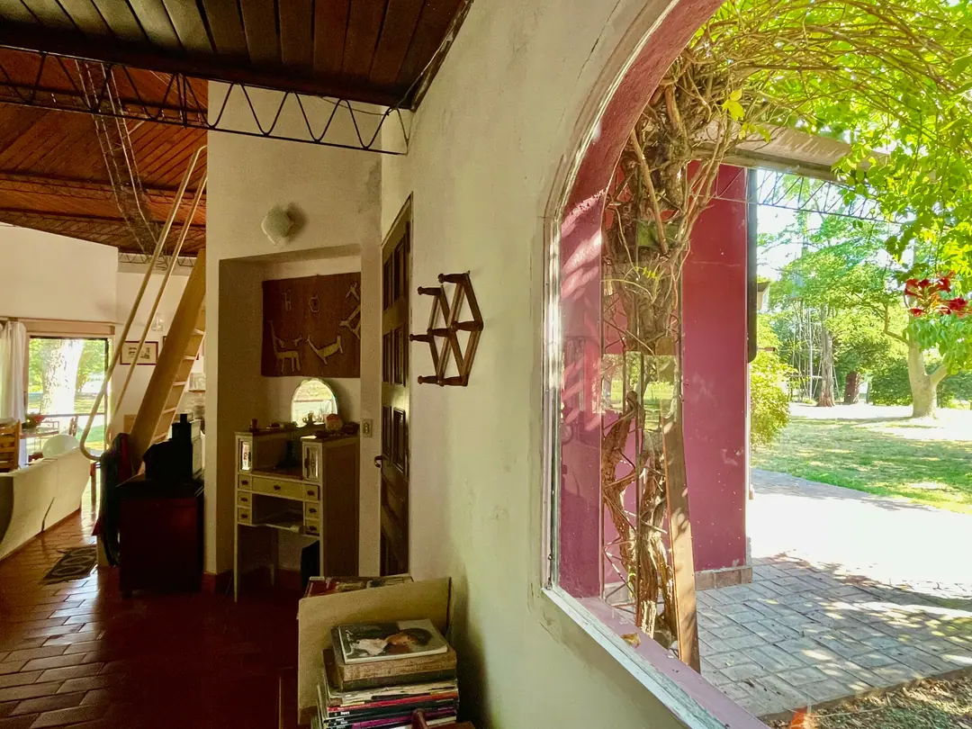 The studio and an arched opening onto the garden
